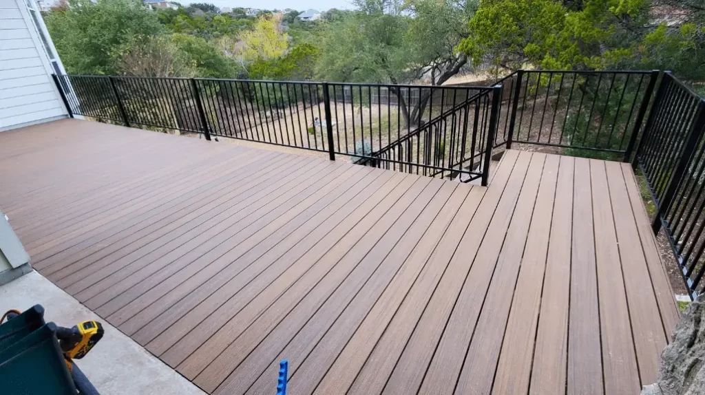 New wood patio deck with railings
